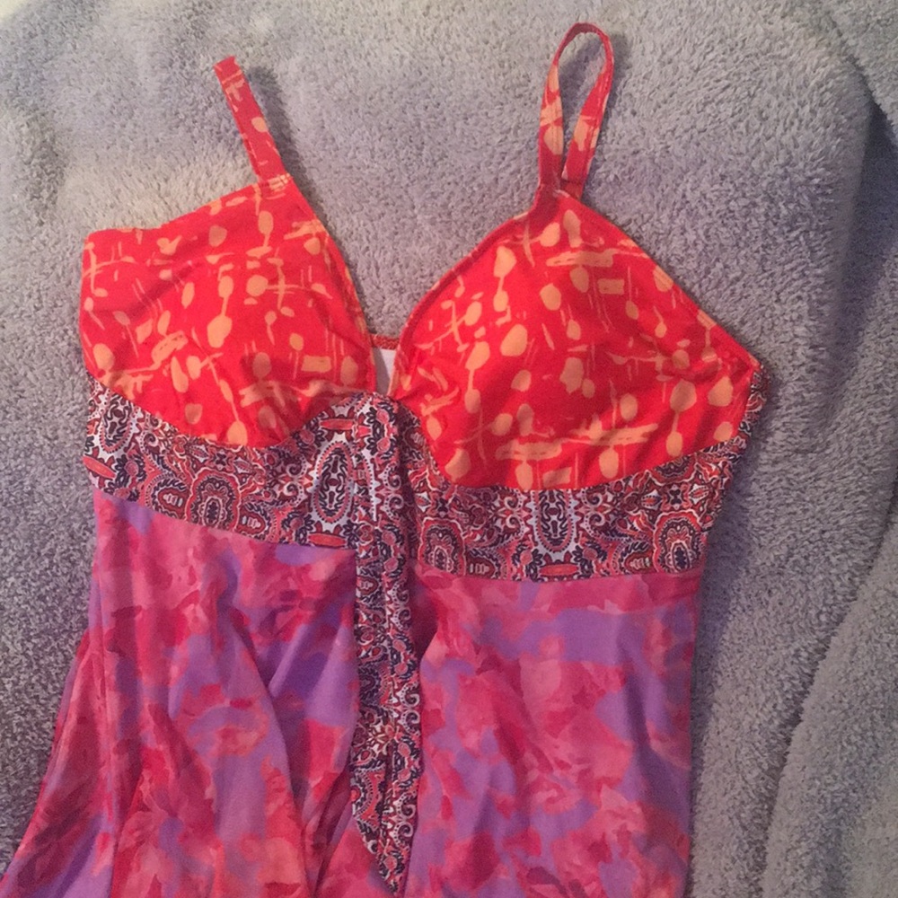 Woman’s XL swim wear shades of Orange,red and purple. Brand new.